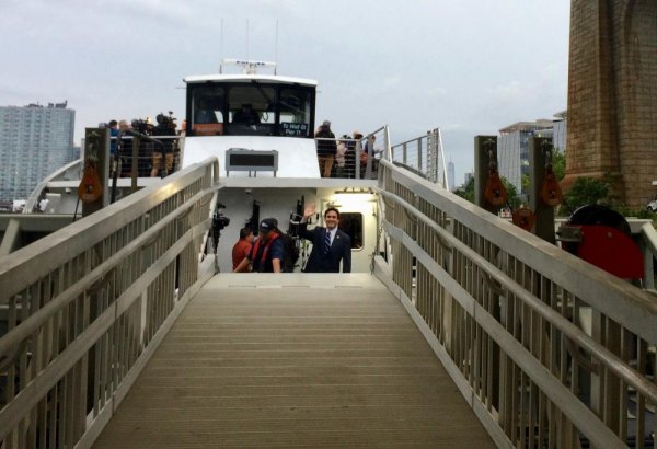 At Last, NYC Ferry Welcomes Roosevelt Islanders Ben Kallos waves goodbye before the first ferry pulls out.